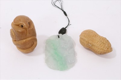 Lot 795 - Chinese carved green jade pendant and two carved nut netsukes