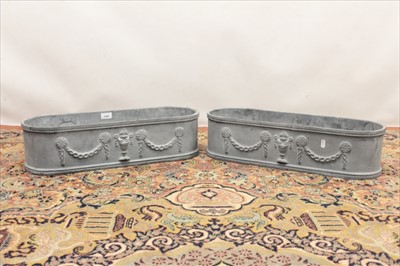 Lot 1385 - Pair of oval leaded Regency style jardinières