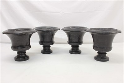 Lot 1384 - Set of four carved marble urns