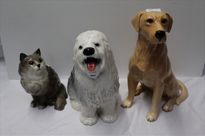 Lot 888 - Three large Beswick fireside animals - Labrador 2314, Old English Sheepdog 2232 and Cat 1867 (3)