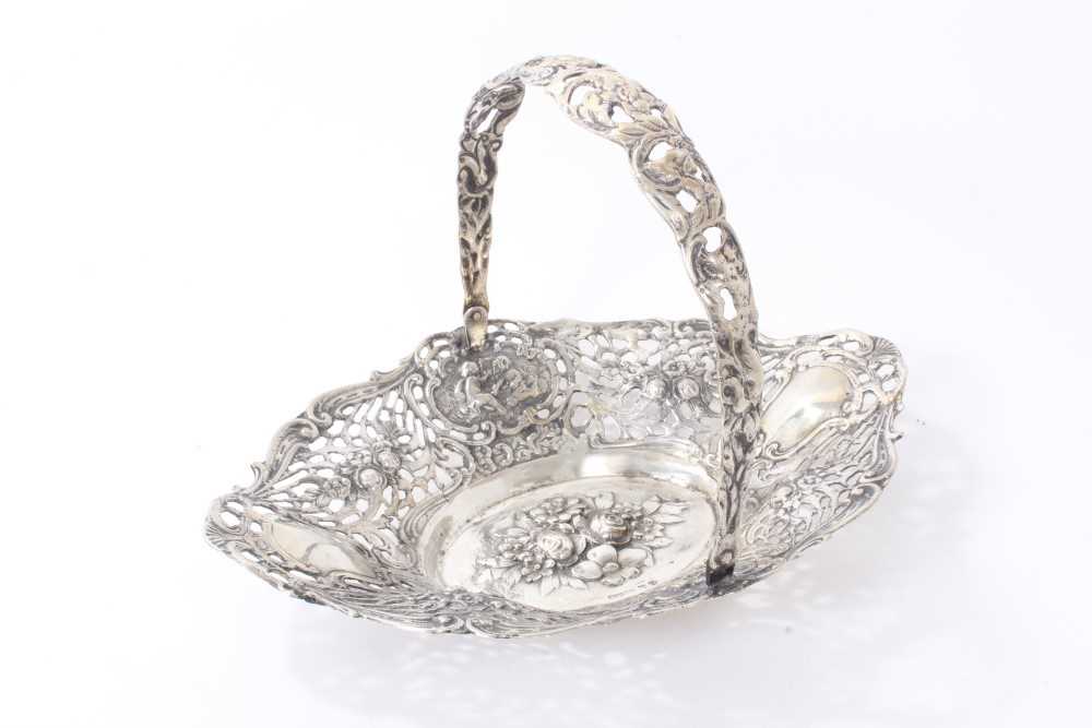 Lot 217 - Contemporary Finnish silver swing handled dish of oval form  date letters K7 .