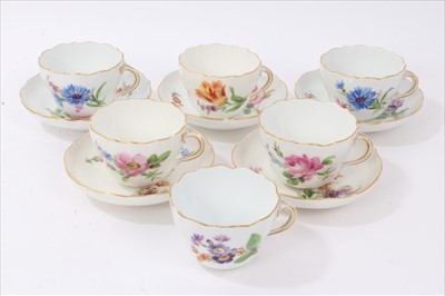 Lot 152 - Set of six 19th century Meissen floral painted cups and five saucers