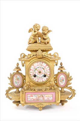 Lot 615 - 19th century French ormolu and porcelain panel inset mantel clock