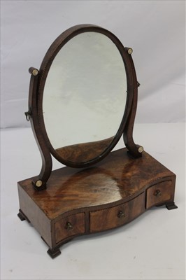 Lot 1318 - George  mahogany serpentine front dressing table mirror with drawers to base