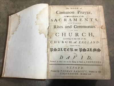 Lot 152 - Book of Common prayer, printed by Thomas Baskett, London 1752, bound together with The Bible, also Thomas Baskett 1752, calf binding