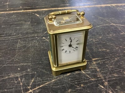 Lot 162 - Miniature brass carriage clock