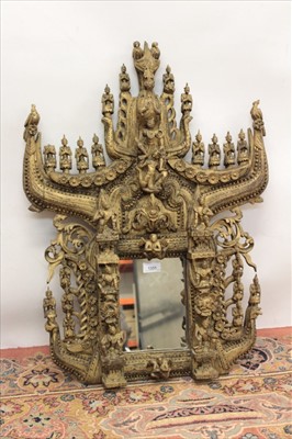 Lot 1331 - Ornately carved Tibetan wall mirror