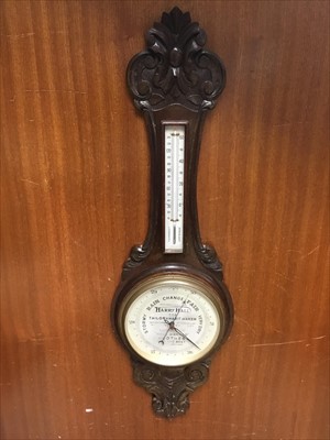 Lot 255 - Unusual Edwardian wheel barometer with advertising to circular dial
