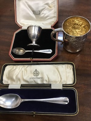 Lot 701 - Victorian silver christening mug, Harrods boxed christening egg cup and spoon and Ellington christening spoon