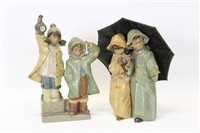 Lot 2186 - Two Lladro Gres figure groups - boy and girl...