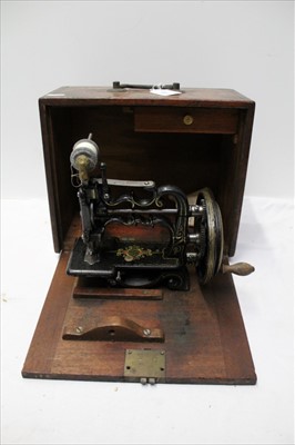 Lot 1887 - Antique sewing machine in wooden case, with engraving reading 'Carlisle Street, Soho, London'