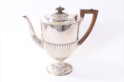 Lot 235 - Late Victorian silver coffee pot of half fluted form.