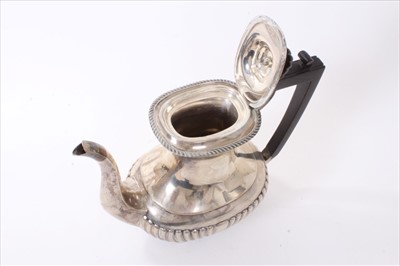 Lot 253 - Edwardian silver coffee pot.