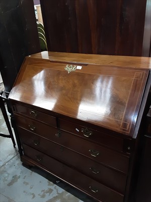 Lot 975 - 19th century inlaid mahogany bureau with fitted interior, two short and three long drawers below on bracket feet