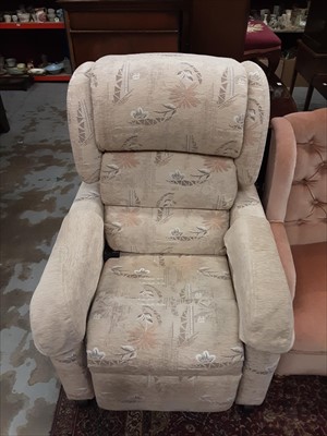 Lot 972 - Two contemporary beige upholstered electric reclining armchairs