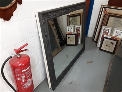 Lot 536 - Pair of contemporary wall mirrors, one black and the other white