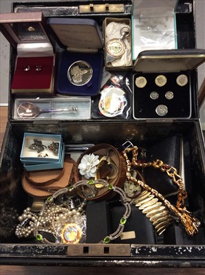 Lot 720 - Black painted tin containing costume jewellery, pair gold 9ct screw back earrings, coins and sundries