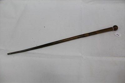 Lot 1976 - Late 19th/early 20th century Rhino Horn walking stick with metal collar and integral rondel handle, 77cm overall length