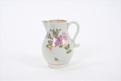 Lot 96 - 18th century Lowestoft sparrow beak cream jug, painted in polychrome enamels with floral sprays, 8cm height