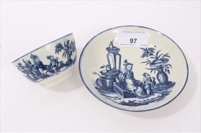 Lot 97 - Worcester tea bowl and saucer, circa 1780, transfer printed with the Mother and Child pattern, crescent marks to bases
