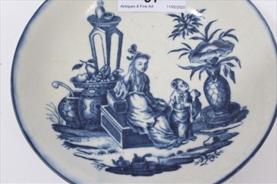 Lot 97 - Worcester tea bowl and saucer, circa 1780, transfer printed with the Mother and Child pattern, crescent marks to bases