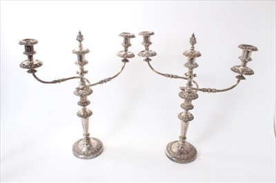 Lot 261 - Pair of 19th century silver plated candelabra and a pair of matching candlesticks.