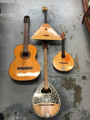 Lot 98 - Group of four musical instruments to include mandolin and classical guitar (4)