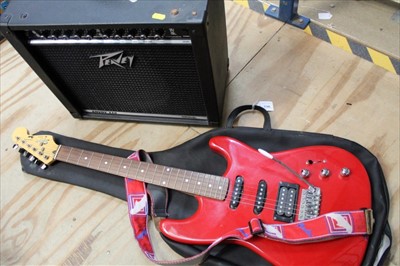 Lot 1740 - Fender Stratocaster Squier electric guitar and case, and a Peavey Envoy 110 amplifier