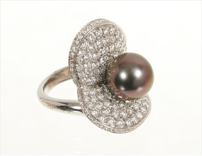 Lot 483 - Diamond and Tahitian cultured grey pearl cocktail ring, the stylised leaf design with a central grey cultured pearl measuring approximately 10.5mm diameter, and pavé set diamonds in 18ct white gold...