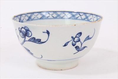 Lot 130 - Bow blue and white tea bowl, painted with flowers, circa 1760