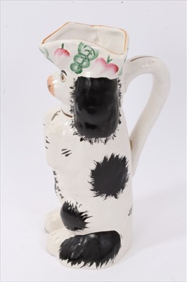 Lot 128 - Late 19th century Staffordshire pottery spaniel jug