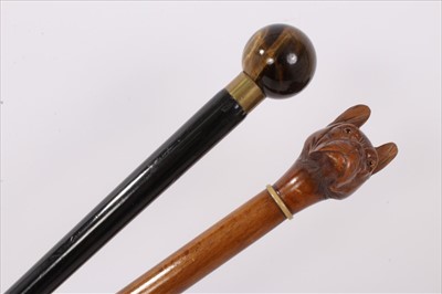 Lot 713 - 19th century ebonised and tiger's eye mounted stick, together with malacca cane