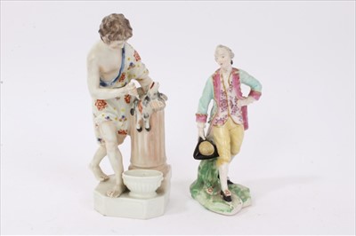 Lot 153 - Two 18th century Derby figures, one of a robed man sacrificing a goat on a pillar