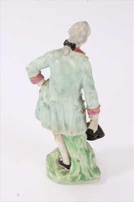 Lot 153 - Two 18th century Derby figures, one of a robed man sacrificing a goat on a pillar