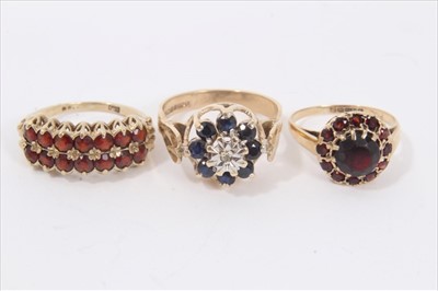 Lot 36 - 9ct gold sapphire cluster ring and two gold garnet rings (3)