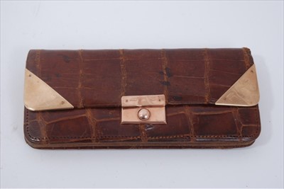 Lot 1677 - Vintage brown crocodile leather purse with gold (9ct) mounts