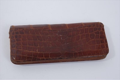 Lot 1677 - Vintage brown crocodile leather purse with gold (9ct) mounts