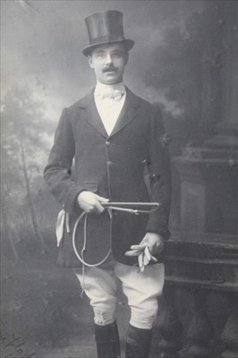 Lot 909 - Edwardian signed black and white portrait photograph depicting Capt. Lancelot Fane Gladwin in hunting attire, signed and dated 1910, in original oak frame, 30cm x 21cm