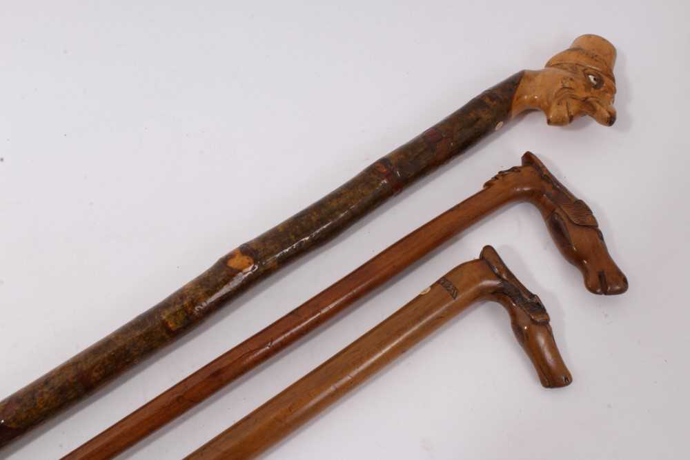 Lot 732 - Antique carved grotesque walking stick