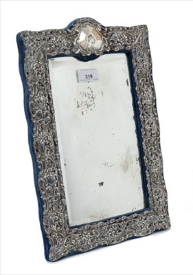 Lot 319 - Victorian silver framed toilet mirror, with easel back