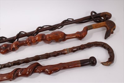 Lot 735 - Antique entwined honeysuckle walking stick, 97cm long, 3 others