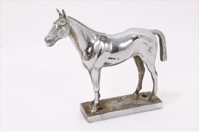 Lot 809 - Vintage chromium plated car mascot in the form of a horse, on rectangular base stamped 'Made In England', 10.5cm high