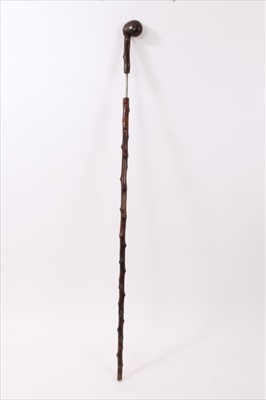 Lot 754 - Antique wooden sword walking stick, with club handle and naturalistic finish, 86cm long