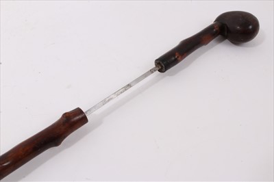 Lot 754 - Antique wooden sword walking stick, with club handle and naturalistic finish, 86cm long