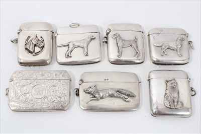 Lot 301 - Collection seventeen Victorian, Edwardian and later silver vesta cases including engraved postman on cycle, enamelled Union Jacks and applied animals (17)