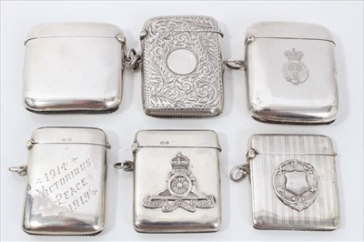 Lot 304 - Collection of twelve Edwardian and later silver vesta cases including military interest (12)