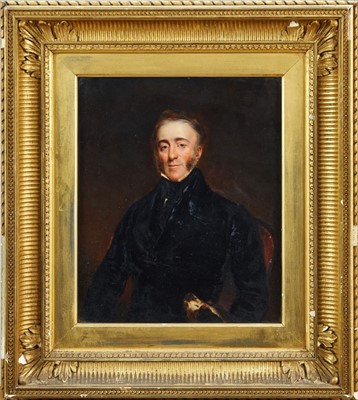 Lot 1036 - English School, mid 19th century oil on panel - portrait of a seated gentleman with spaniel beside, in gilt frame