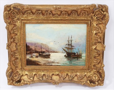 Lot 1067 - Dudley Hardy (1865-1922) oil on panel - coastal scene with a two masted sailing vessel off the coast and fisherfolk unloading their catch, signed, 23cm x 28cm