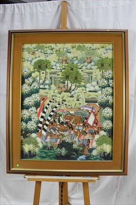 Lot 1081 - Balinese School, 20th century, mixed media on board - Processional scene, signed and inscribed, framed, 85cm x 67cm