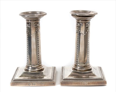 Lot 314 - Matched pair of late Victorian silver candlesticks